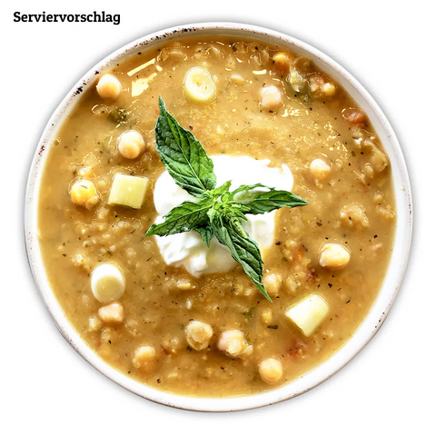Cremig-vollmundige Kichererbsensuppe reich an duftenden Gewürzen - Serviervorschlag.